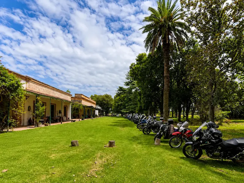Group of bikers sharing a countryside barbecue at El Carmen